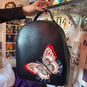Black leather butterfly backpack
